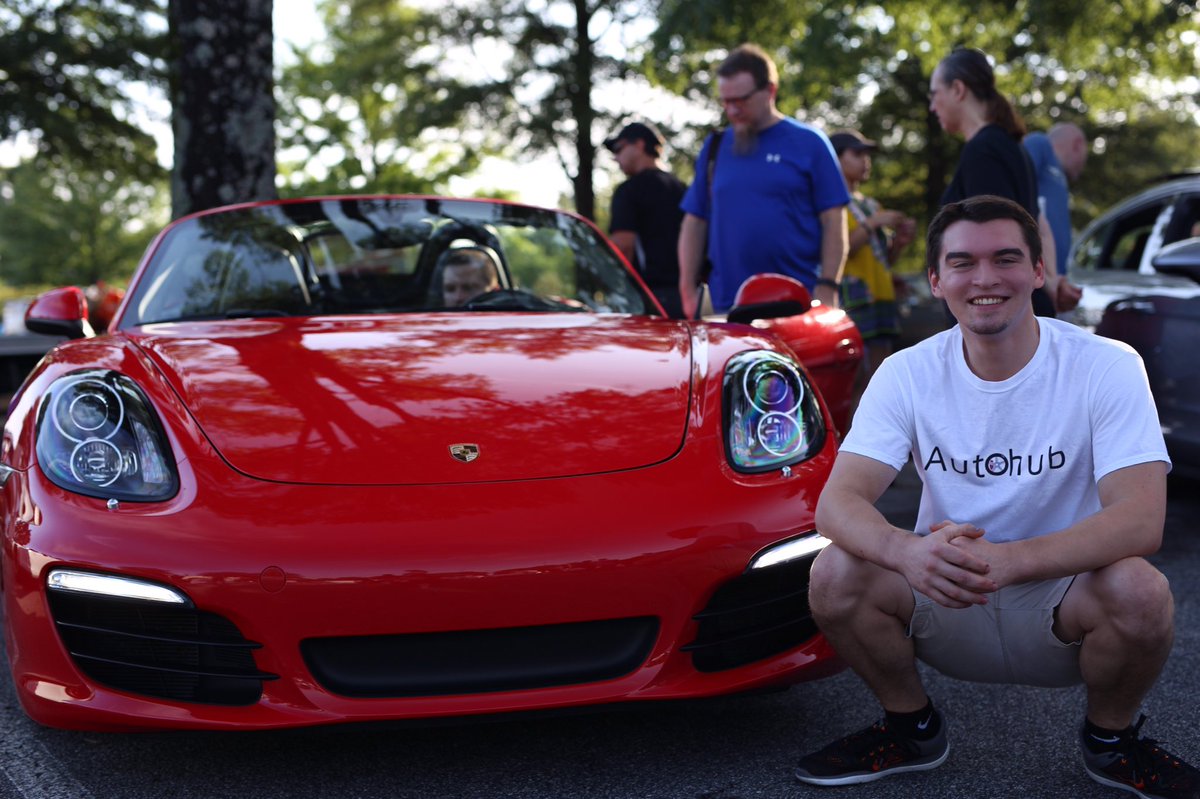 AutohubI's tweet photo. Here's one of our founders, Chris Clark. Next to a beautiful red 911 Porsche at Caffeine and Octane last weekend. Go check out our app!! https://t.co/Hou6wZRrWD