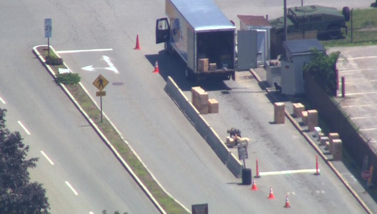 Boxes are being unloaded from moving truck on <a href="/hanscom_afb/">Hanscom AFB</a>. So far we haven't seen boxes being opened wcvb.com/article/securi…