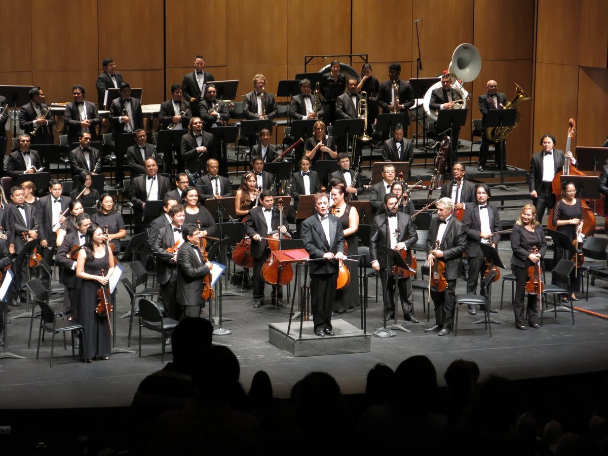 Cultura_Ec's tweet photo. RECUERDA | Mañana a las 19h30 en el Teatro Centro Cívico de #Guayaquil se realizará el concierto de la @Orq_Sinf_Gye. ¡No puedes faltar! https://t.co/JM6eazFwIS