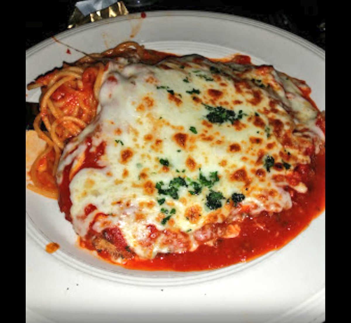 CaposRestaurant's tweet photo. We love seeing your #CaposRestaurant dinner pix! Here's Nelson Ng's veal parm...👏😋 #Italian #LikeMommaMade #WhatsThePassword #GetOvahHere https://t.co/lgZnOGVrA2