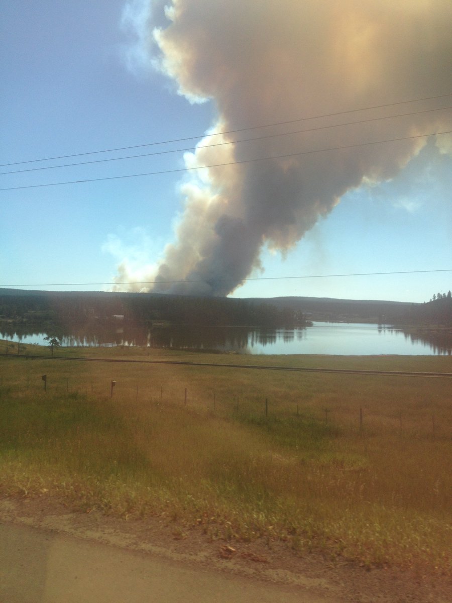 BethVeenkamp's tweet photo. @DriveBC Hwy 97 at 100 Mile  - water bombers buzz Hwy https://t.co/gNag2b2zir