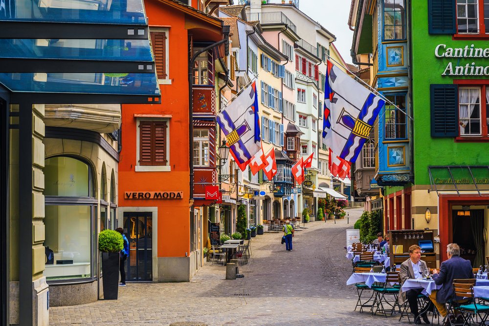 Traditional urbanism has short blocks. No building takes more than 3-4 seconds to walk past, providing interesting colors, shops, textures.