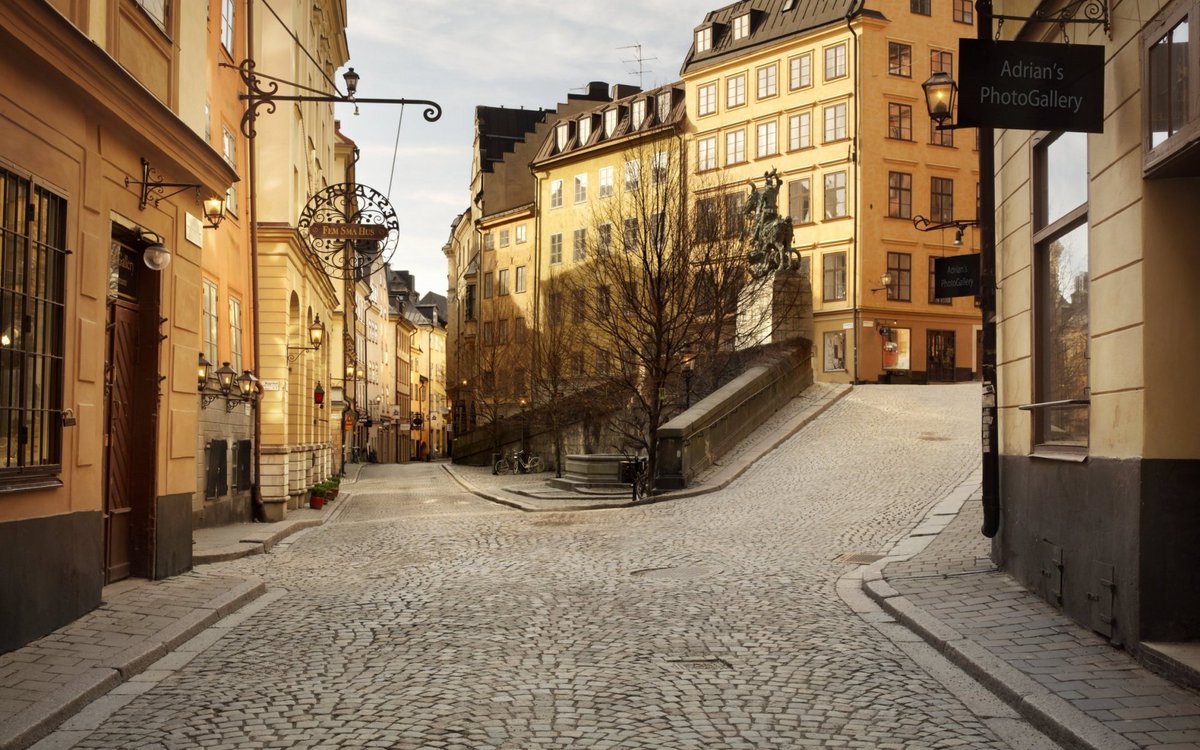 Traditional towns built with terrain: hills, valleys, stairs, steps, corners, odd squares. Landscaping unnecessary/uneconomical. (Stockholm)