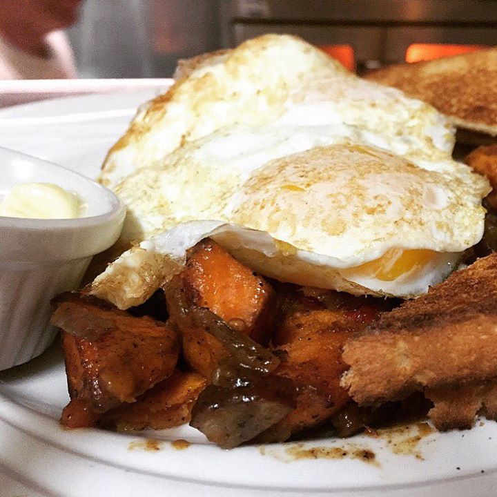 Gear up for the weekend with our signature Hash Potatoes and Eggs :: 2 eggs your way over sweet potato and smoked sausage hash $9 #awesome