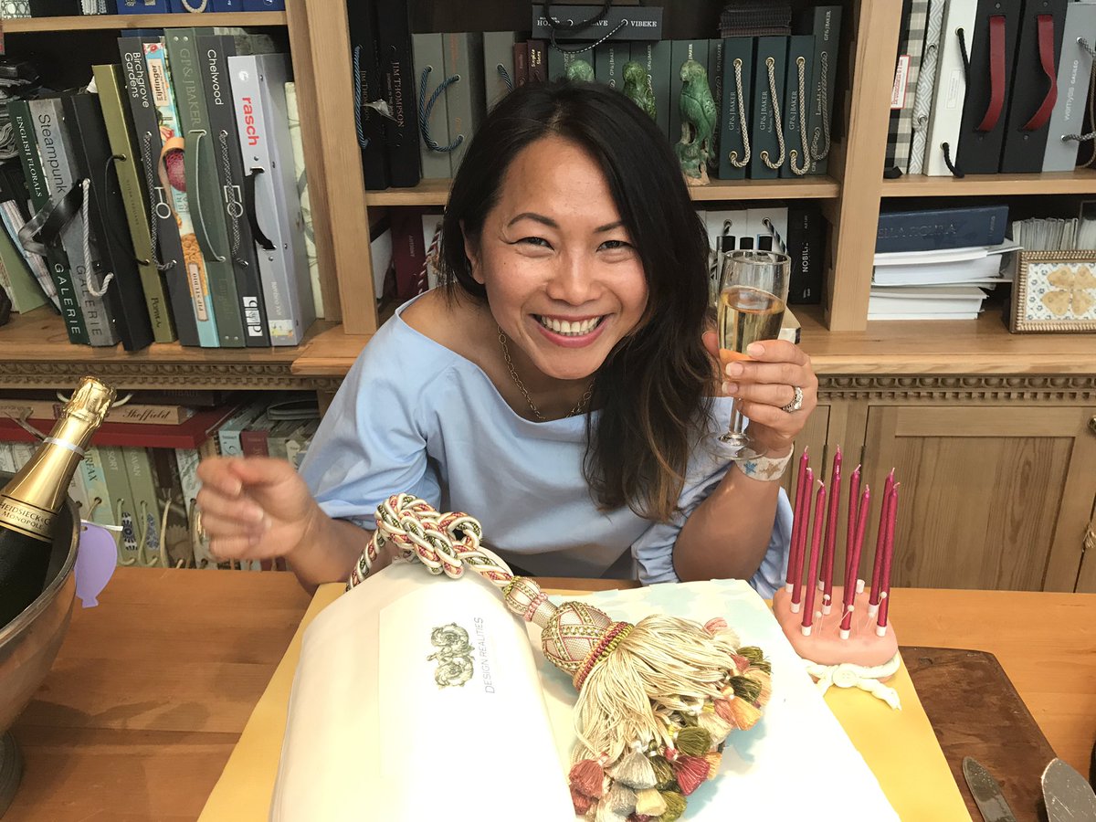 DesignRealities's tweet image. Me with our fabric book cake that's too good to present to a design meeting!