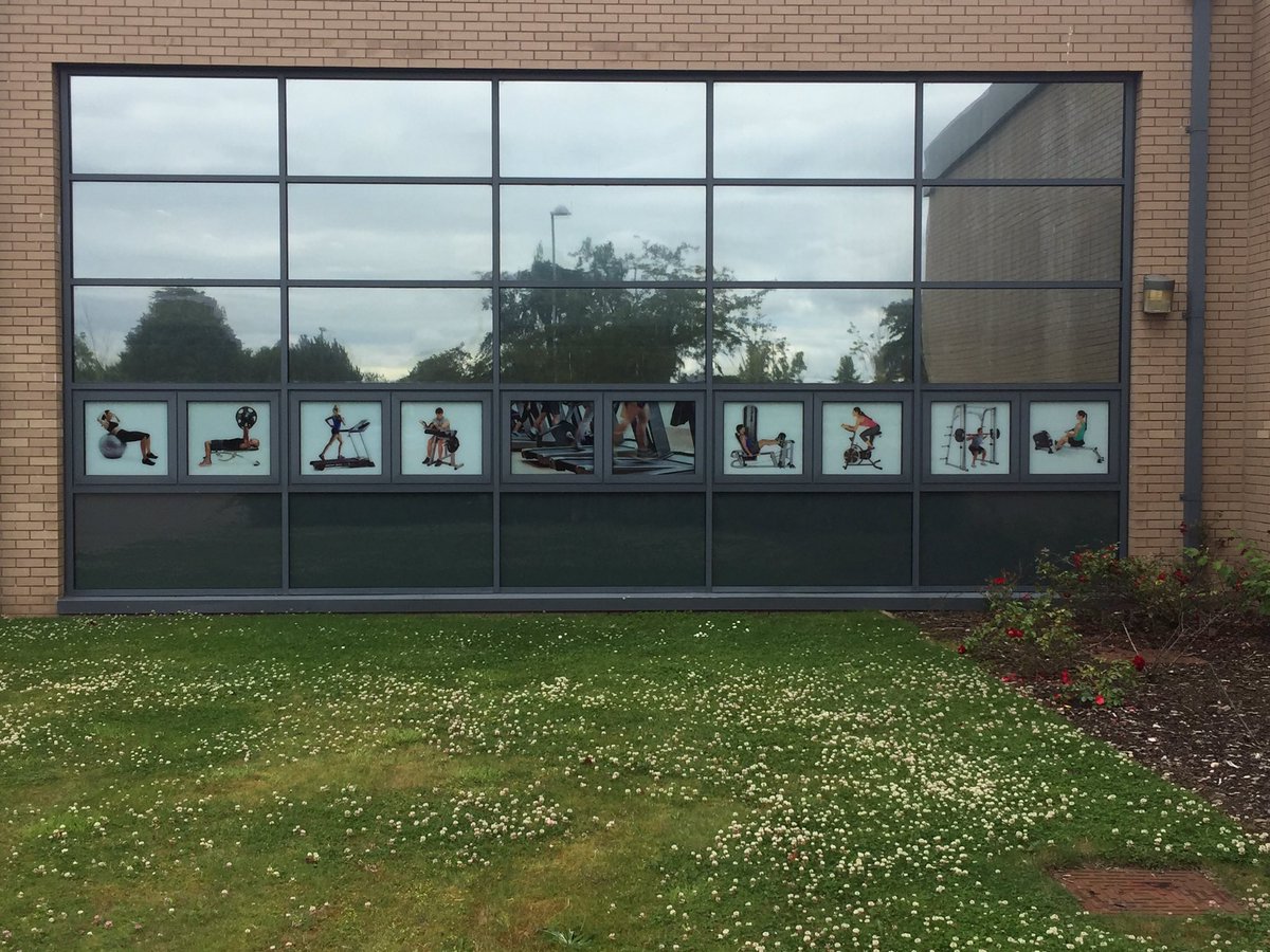 Long day stripping window film off at craigroyston high school, end product worth it. New digital prints with grey vinyl on bottom panels