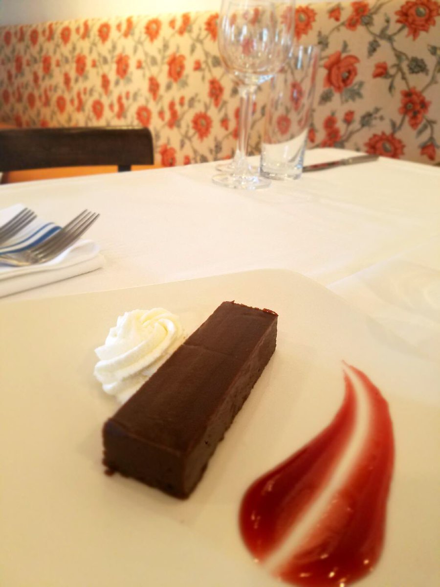 Chocolate Decadence Cake -Dense Flourless Chocolate Cake with Chantilly Cream and Raspberry Coulis #nationalchocolateday #austin