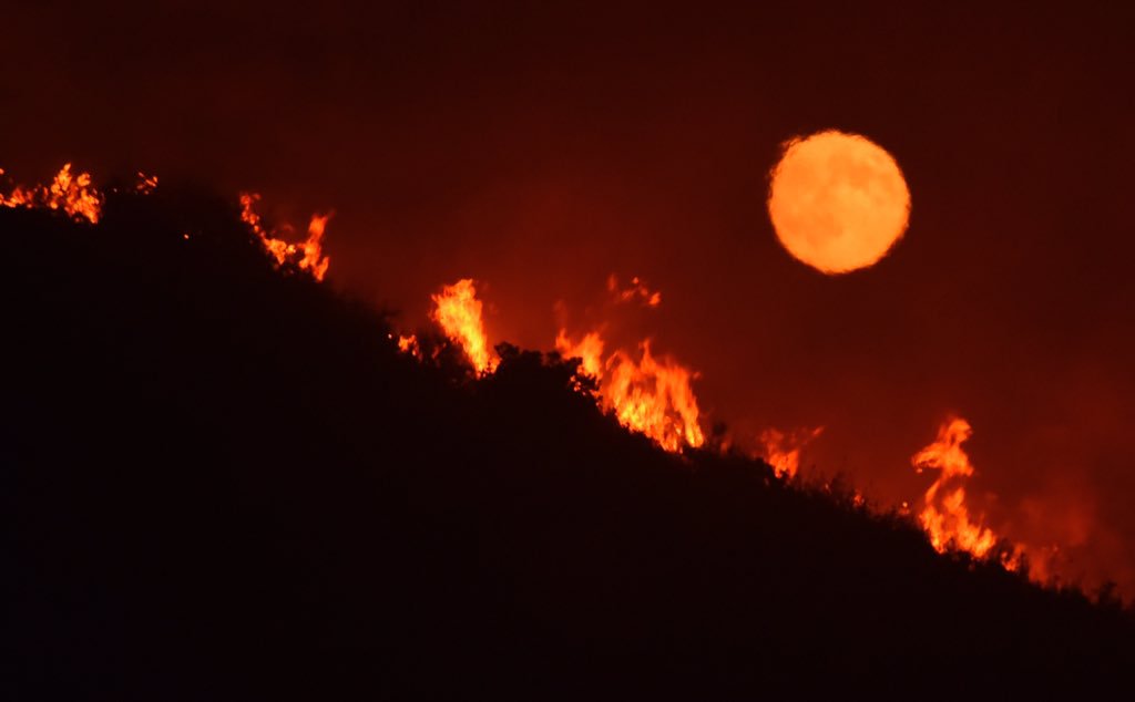 Vegetation Fire-#AlamoFire-The full moon rises over flames on a hilltop off Highway 166 east of Santa Maria. *Call Newsline For Fire Info*