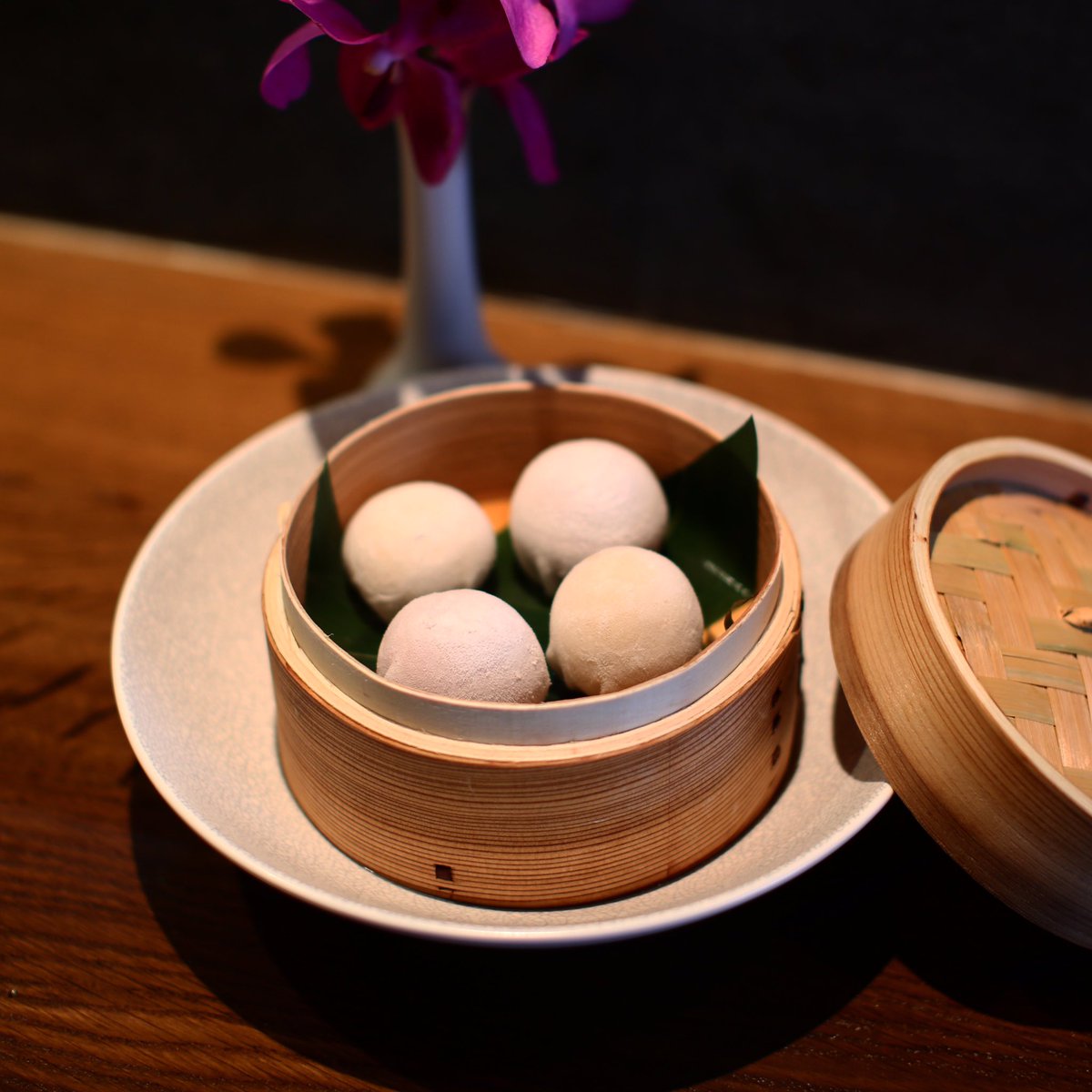Frozen mochi for dessert at #sakerestaurant. Half caramel and miso, half raspberry and white chocolate!