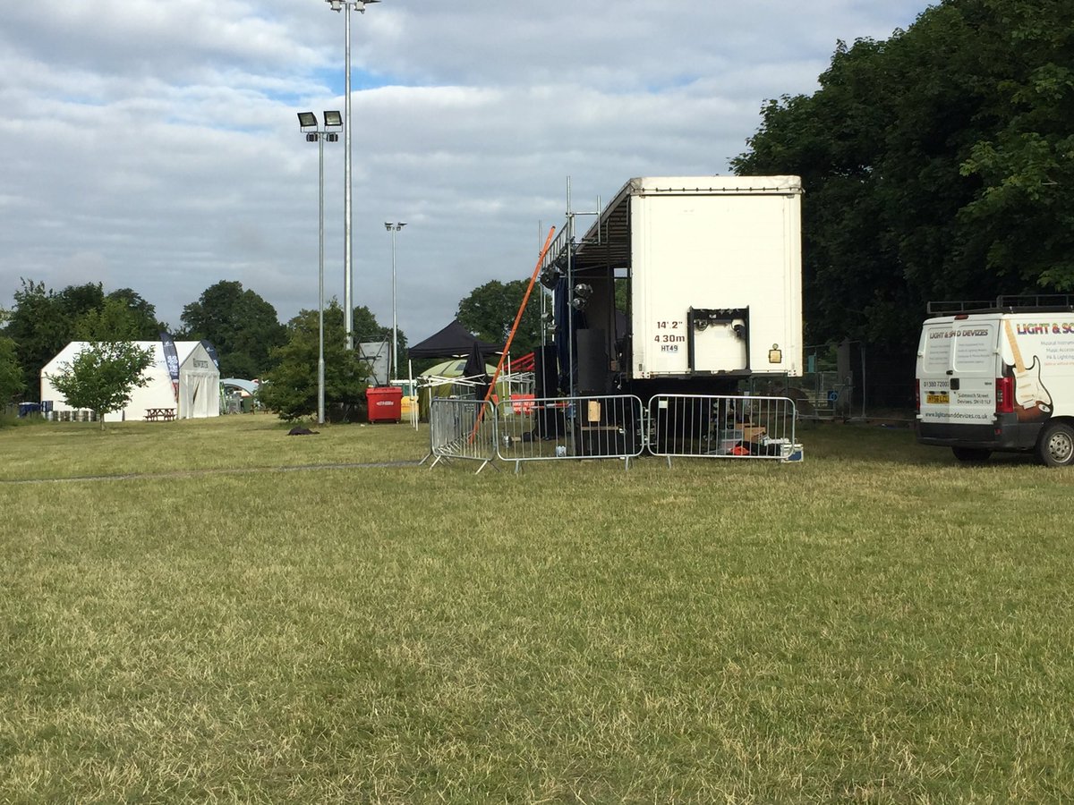 DevizesRFC's tweet photo. The calm before the masses arrive - festival site looking amazing! Tickets still available, come on down from 11am @SCDevizes 🎶🎶🎶 
⚫️⚪️⚫️ https://t.co/8BfZcQoMVf