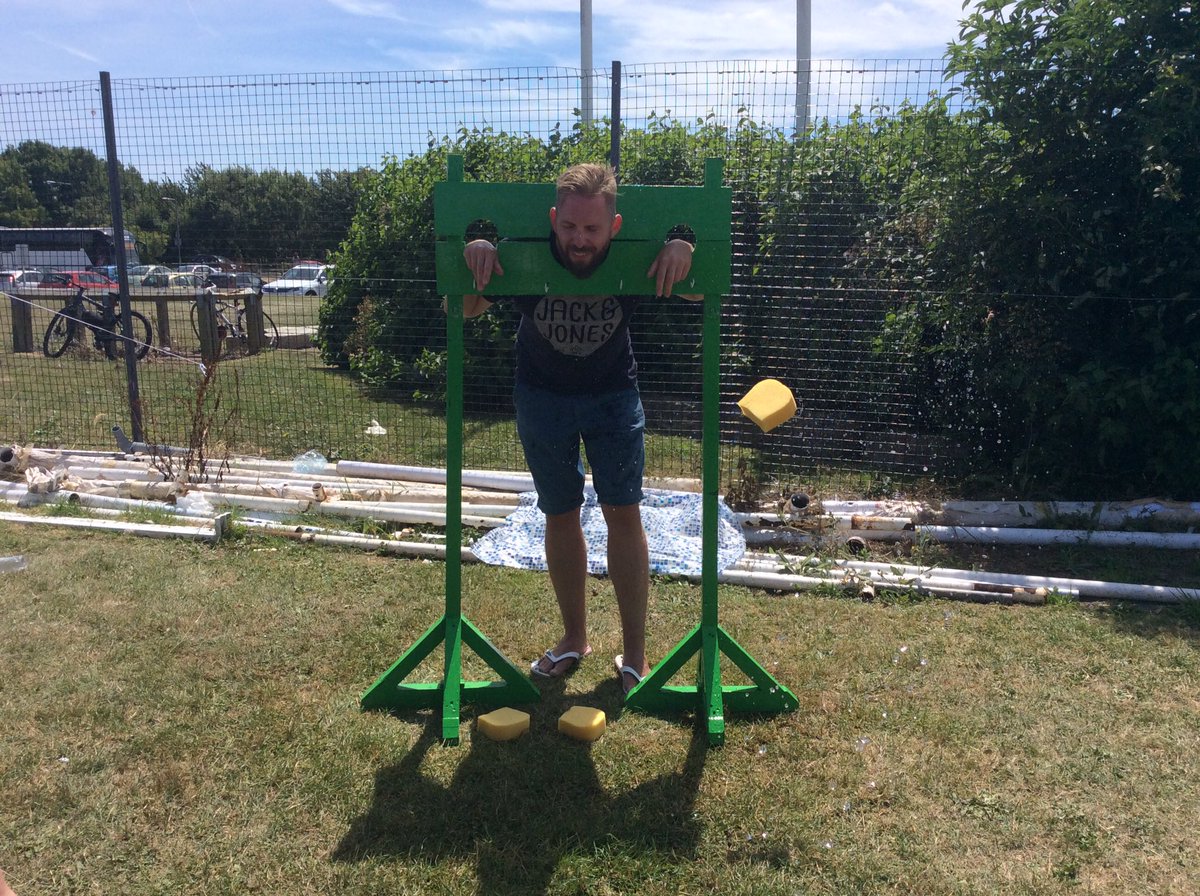 StCCInvincible's tweet photo. Raising money for the house charities -sponge the teacher! @StCCEastbourne sports day #wegotsoaked https://t.co/YyjDZ22zd4