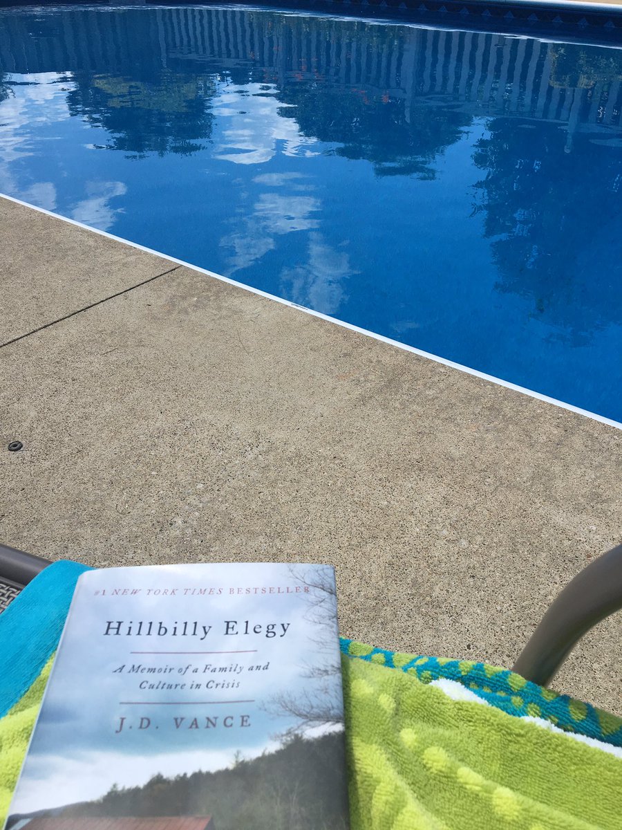 Book club book reading poolside while listening to Alabama Shakes radio. R&amp;R feels good