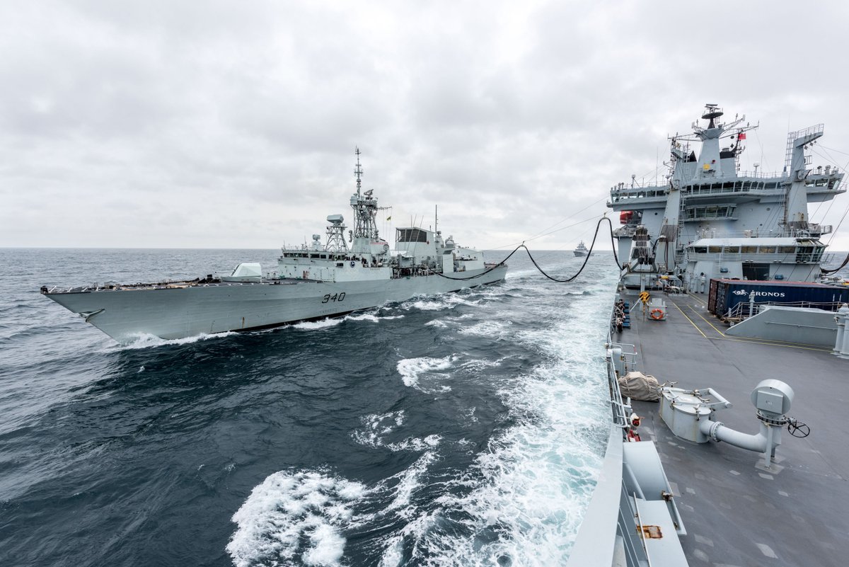 CanadaNATO's tweet photo. 🇨🇦HCMS St John's is replenished by 🇬🇧RFA Wave Ruler during #NATO Exercise #DynamicMongoose 17 last week. #WeAreNATO https://t.co/B2TJVPZDC7