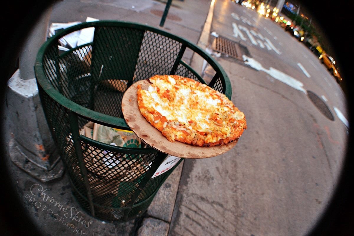 ♪ 'Hot town, #summer in the city...'♪— oh hey, look, a #pizza. 🍕 

#nyc #urban #timesquare #newyork #fisheye #fisheyelens #photography #city