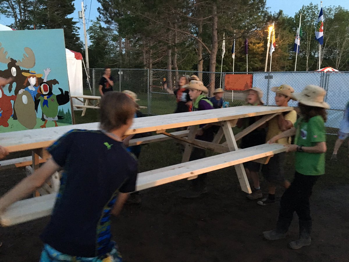 Pitmanme's tweet photo. After a day of walking, program and activity #27thGuelph spent an hour carrying picnic tables  into the square @CJ17NovaScotia #proudScouter https://t.co/5arYb2ZHkH