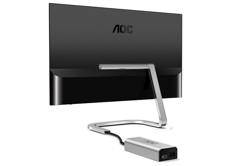 verge's tweet photo. AOC and Porsche designed a monitor with no hanging cables https://t.co/AfI5TKojvk https://t.co/4AbqLUCwSF