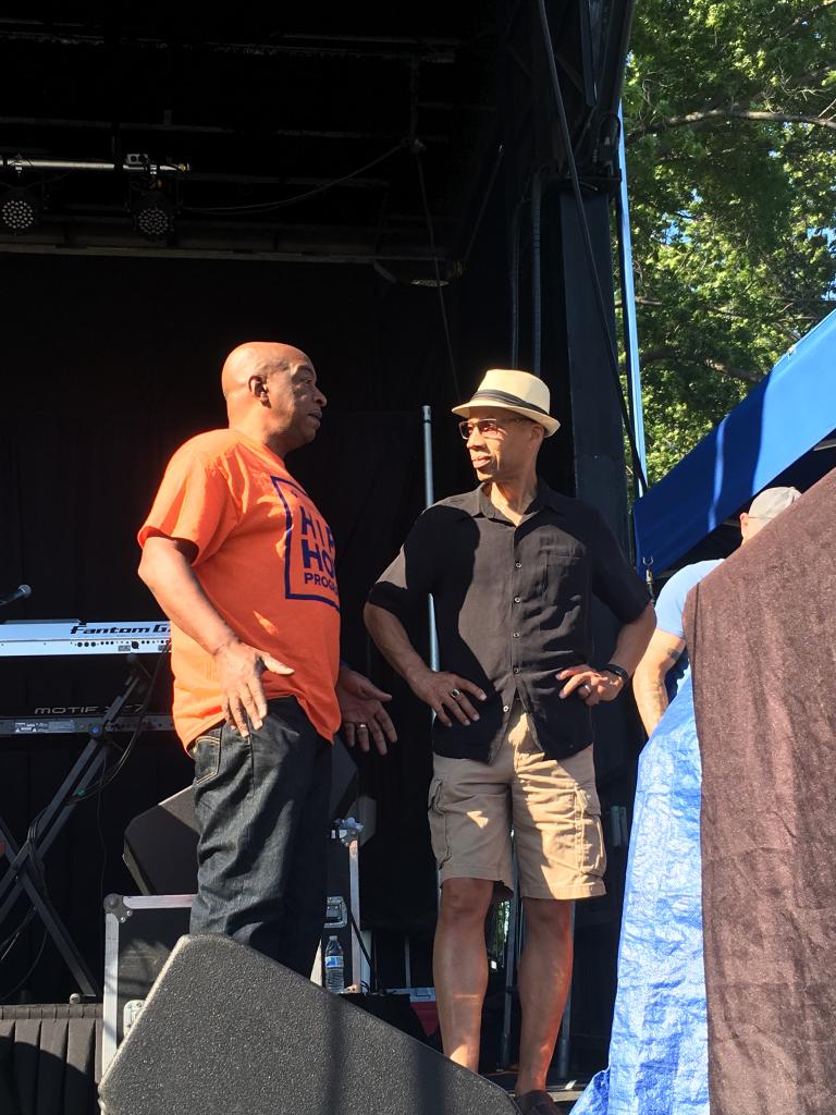 QPLNYC's tweet photo. Our #HipHop Coordinator @VideoMusicBox & our CEO #LibraryDennis before greeting the crowd at the @Summerstage concert at #SpringfieldPark! https://t.co/Ss4IDae8Is