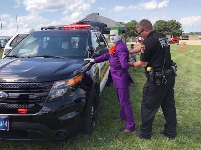 CityOfAnkeny's tweet photo. The Joker showed up at #AnkenySummerFest today! Luckily #Ankeny Police Department's Detective Wilson caught up with him! #sfheroesunite https://t.co/aUTN5ocYec