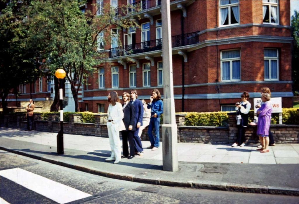 BoredWeb3's tweet photo. The Beatles waiting to cross Abbey Road during the shooting of their legendary album cover. 📷 Linda McCartney. https://t.co/nc4MyZwn4V