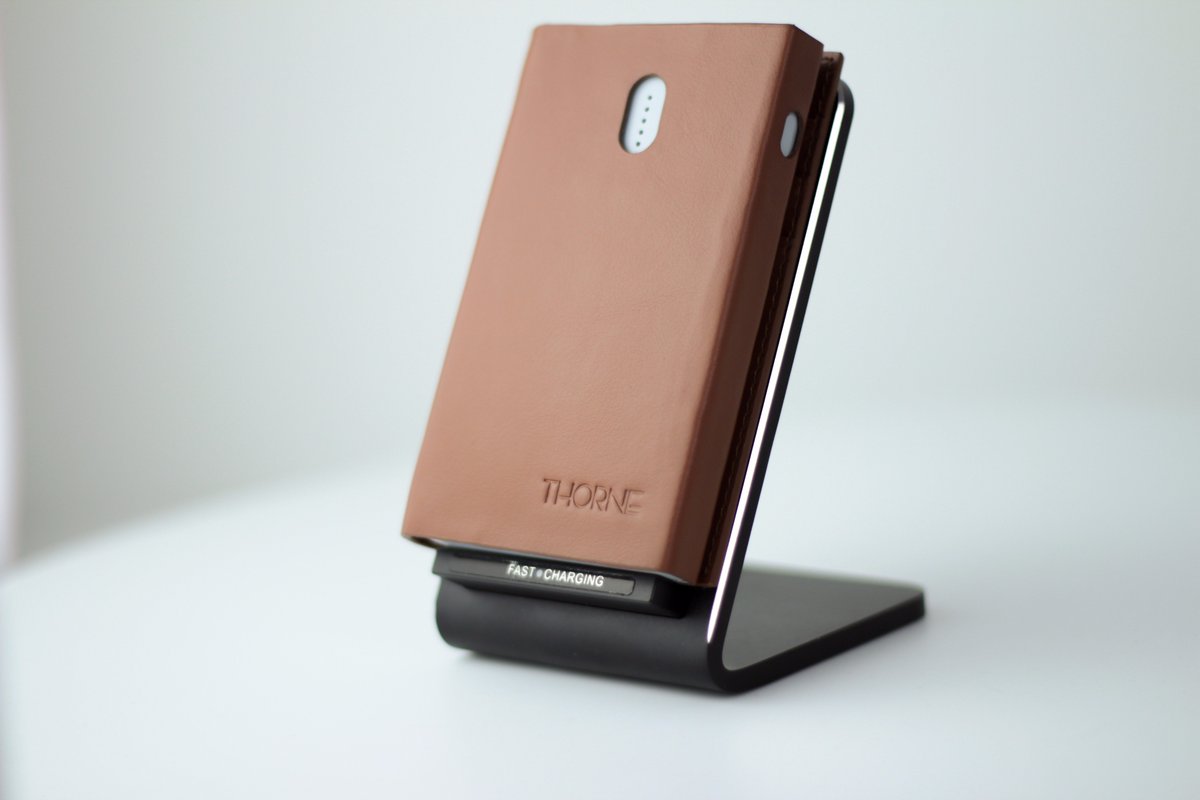 ThorneWallet's tweet photo. Did you know that you can charge your Thorne Wallet or your smartphone with our wireless charger? https://t.co/GAs2ITYCV6 #smarttech https://t.co/FQM2Y4tsLC