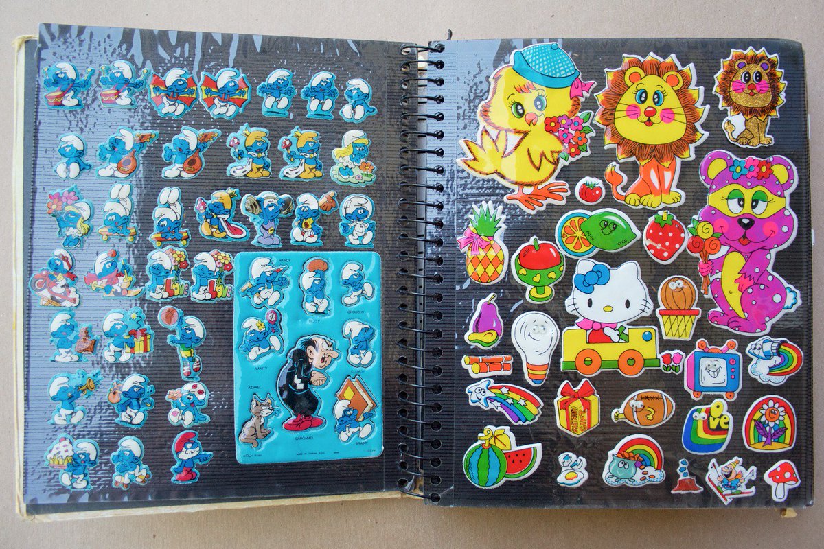 WooWork's tweet image. My sticker book from the early 80's; gently scratched, heavily sniffed.