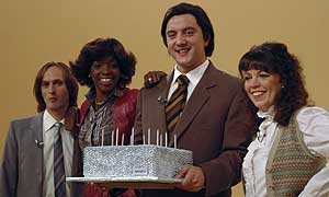 Happy birthday, dear Peter happy birthday to you. [consults copybook to remember second verse] 