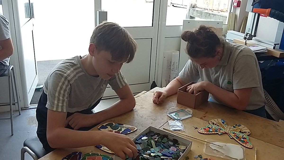 TheRowansDT's tweet photo. Lovely start to Activities Week - beautiful mosaic butterflies created today by our very talented pupils @TheRowansDT https://t.co/atddSdTspw