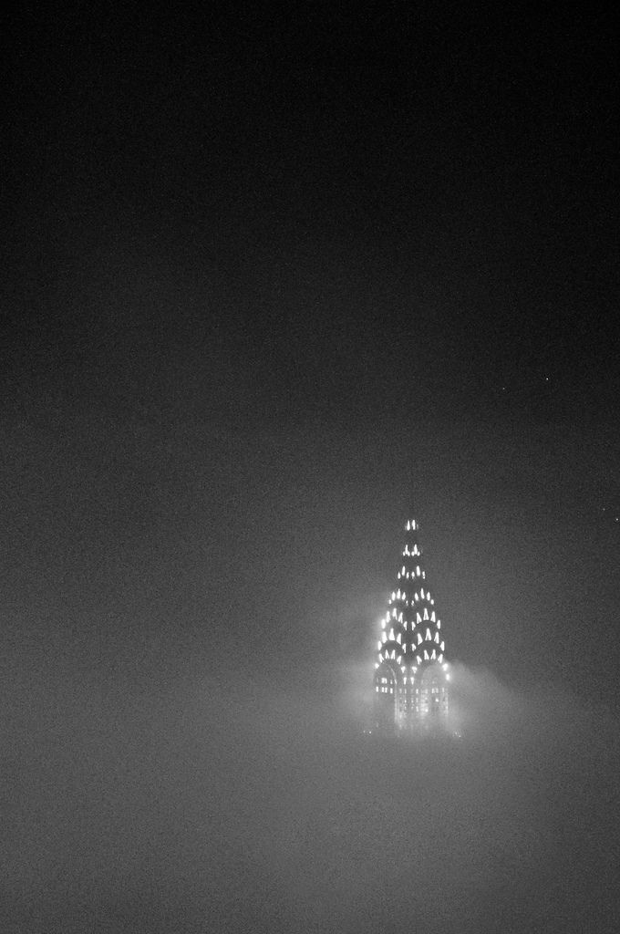 Good evening, "New York Above the Clouds" by Jeremy Tan. #NewYork #NYC #ChryslerBuilding #skyscrapper #fog #mist #blackandwhitephotography