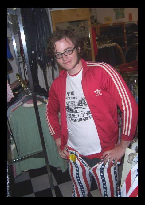Me wearing American flag pants in a clothing store