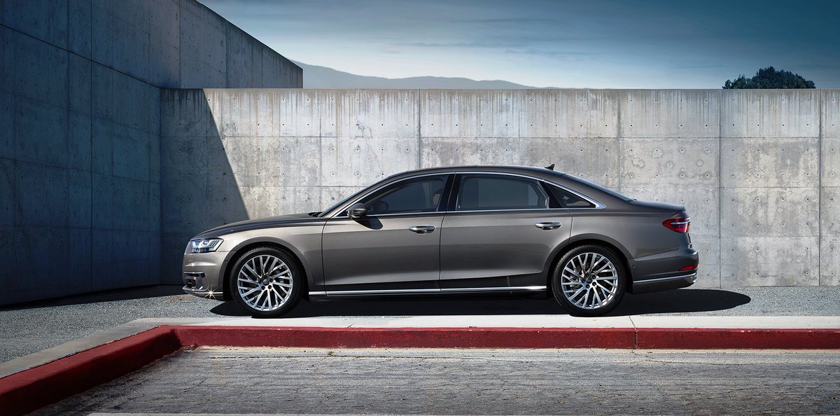 AudiOfficial's tweet image. Here it is - our new baby: The all-new #AudiA8 #AudiSummit #NoMoreCamouflage