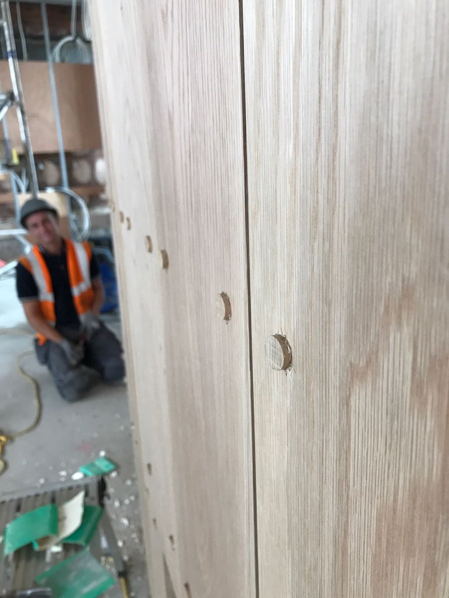 The photos don't do this beautiful cladding to the creative play area justice.