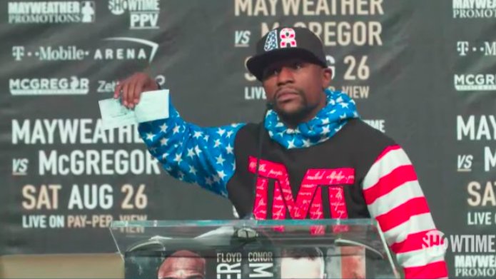 Sporf's tweet image. Floyd Mayweather: "Wanna see what a $100m fight looks like?"

*Floyd pulls out a cheque*

Conor McGregor: "That's for the tax man..." 😂🔥