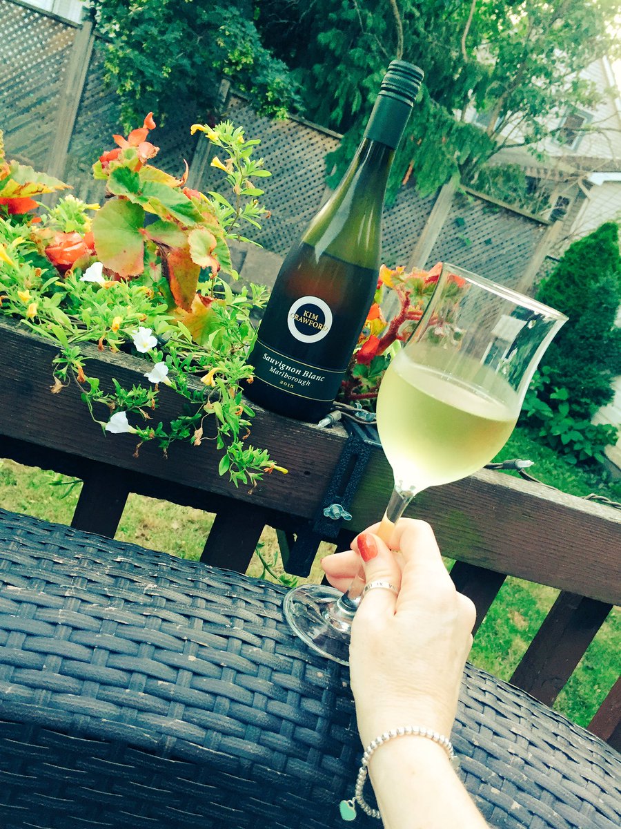 It was hot today - so I heard! Time to escape work & chill outside with a refreshing glass of #KimCrawford #wine 

#outdoorcouch
#summerfun