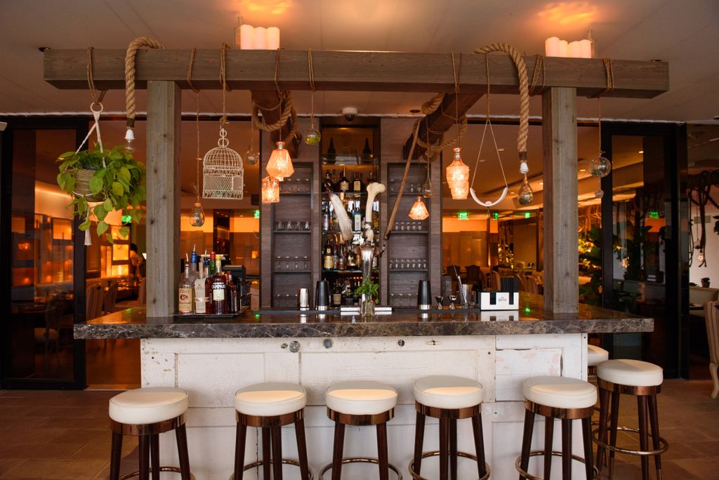 Pick your favorite seat! Our Sunset Happy Hour is available daily from 5-8pm featuring $7 bites, Cocktails &amp; $5 beer.