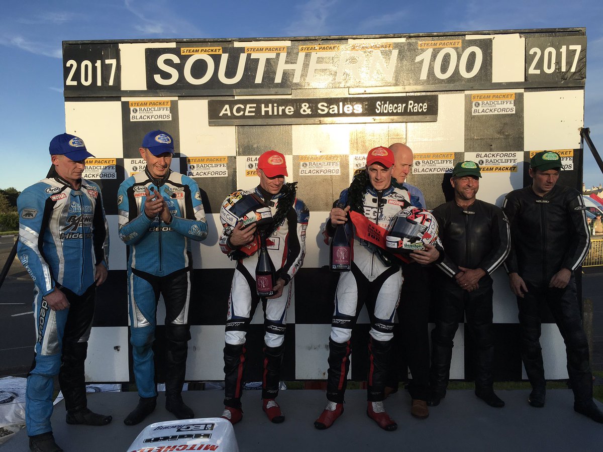 S100isleofman's tweet photo. #S100 Ace Hire Sidcar race 1st Ben &amp; Tom Birchall 2 John Holden &amp; Lee Cain 3 Wayne Lockey &amp; Mark Sayers  podium fizz by #ForagingVintners https://t.co/ekHS5UFz3v