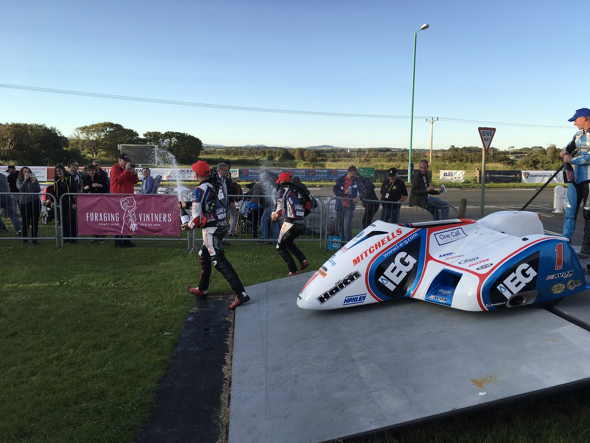 S100isleofman's tweet photo. #S100 Ace Hire Sidcar race 1st Ben &amp; Tom Birchall 2 John Holden &amp; Lee Cain 3 Wayne Lockey &amp; Mark Sayers  podium fizz by #ForagingVintners https://t.co/ekHS5UFz3v