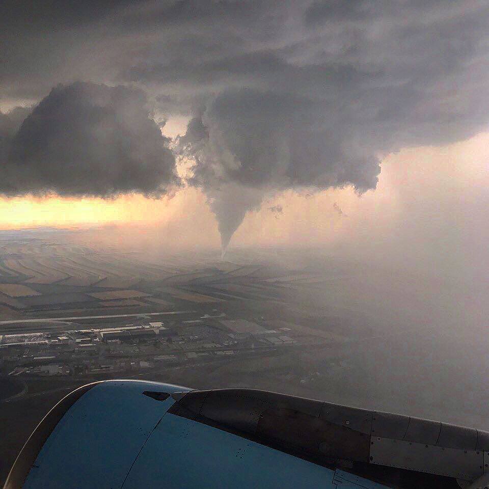 mark_tarello's tweet photo. WOW! Tornado seen from the airplane Monday in Vienna, Austria. Photo credit: Olga Bystrina. #Tornado #Austria https://t.co/dWr6Rwch01