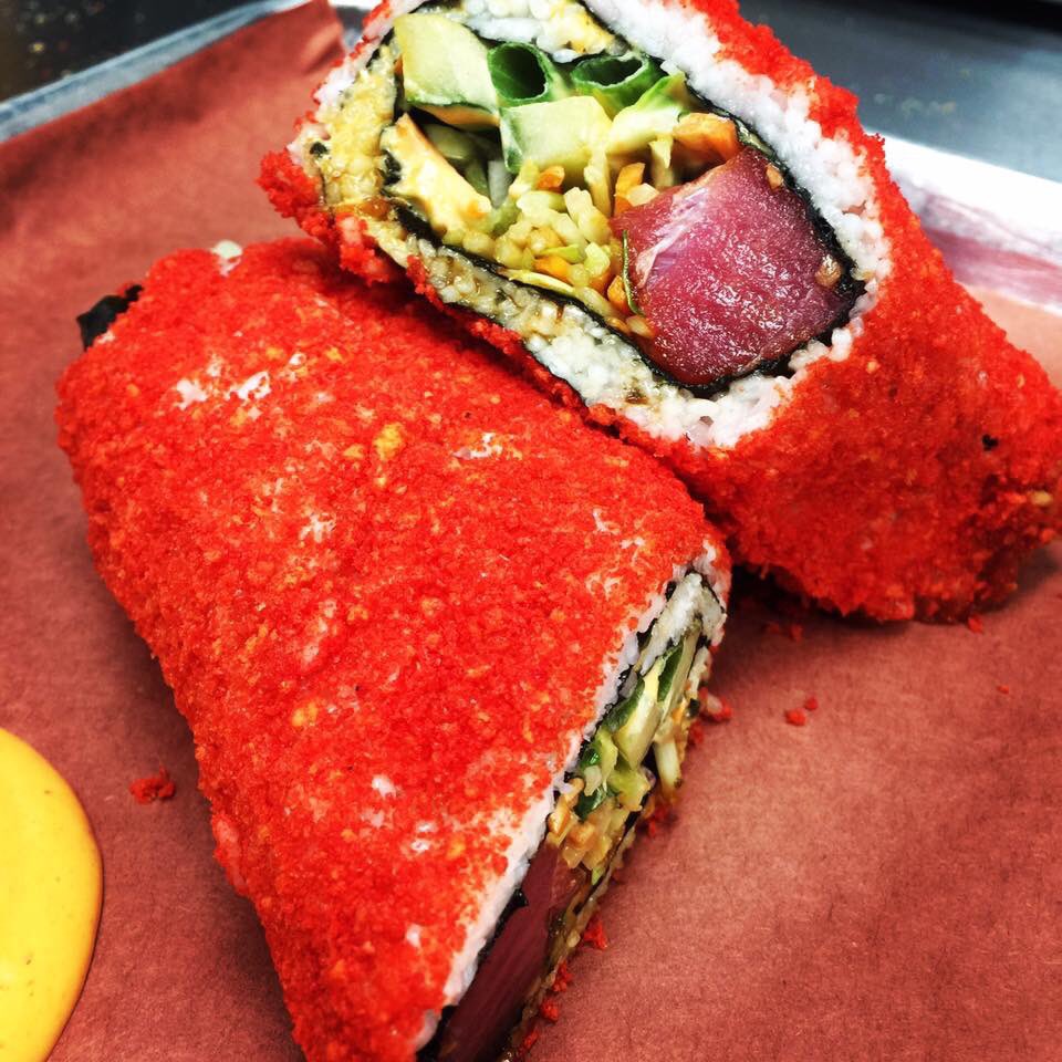 Sugarfirestl's tweet photo. Flaming hot Cheetos Encrusted sushi Burrito https://t.co/iSBk8oVc6X