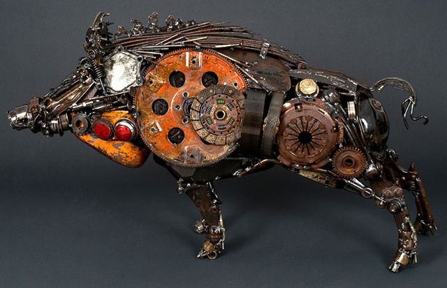 Distinctboxes's tweet photo. Sculpture made by Austrian Artist James Corbett, he creates them by using old car parts taken from scrap yards. https://t.co/Scs0jQm7fd