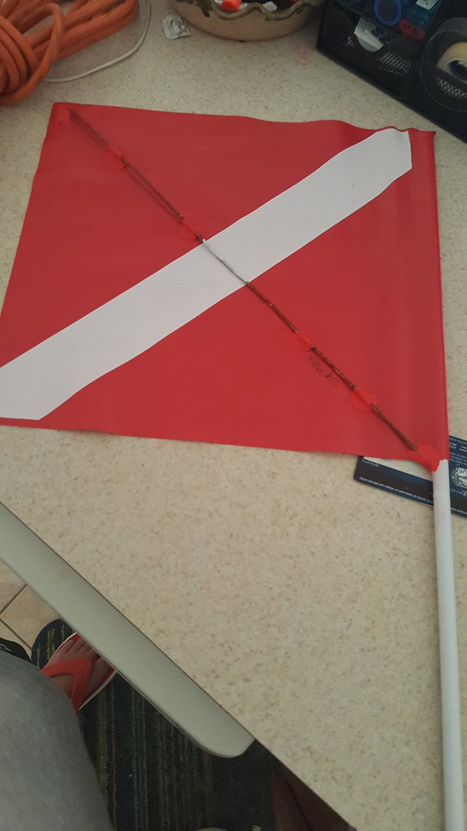 escapemechanic's tweet image. Law requires that dive flag has to stay unfurled even with no wind. @sugru to rescue! #diverdown