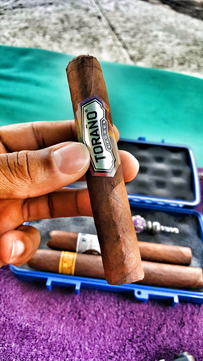 CONDOISHIM's tweet photo. Since I'm not @theIPCPR this year it's only right I light up and put some smoke in the air with @ToranoCigar. #Hello #StogieLifeStyle https://t.co/PC9WQIRmxN