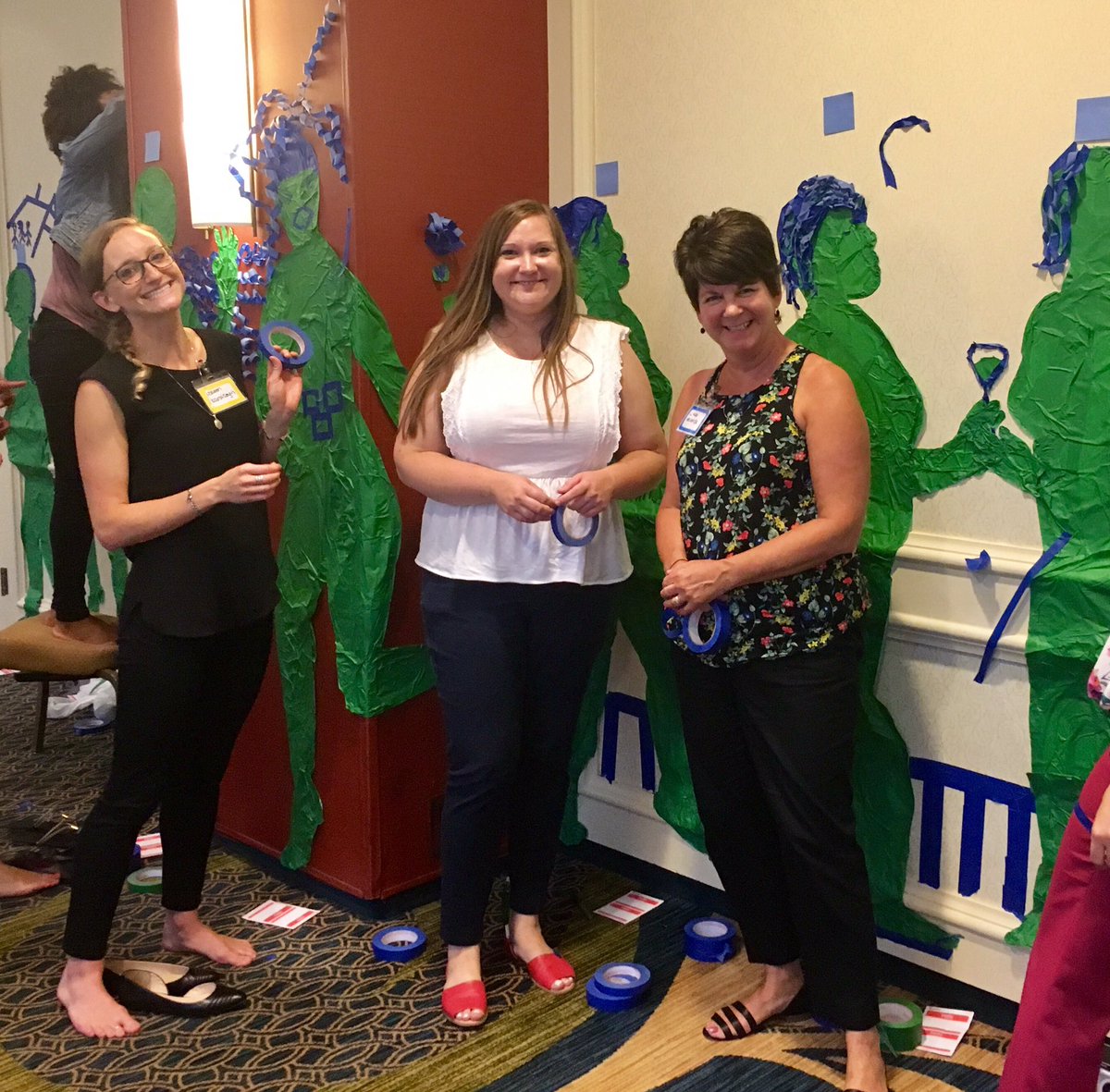 fdl424's tweet photo. Hard at work with tape! #womenin IBM https://t.co/402xNUmbkS