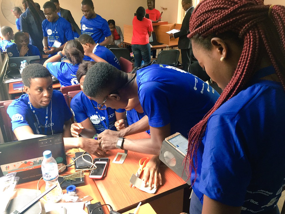 Members of Team Humanity developing their prototype – Green Lens.