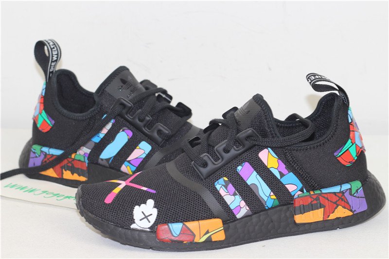 nmd r1 x kaws