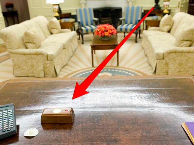 YahooFinance's tweet photo. There's a tiny red button on Trump's desk — here's what happens when he presses it https://t.co/LqFnR1Bhkm https://t.co/7wo1sPY5IJ
