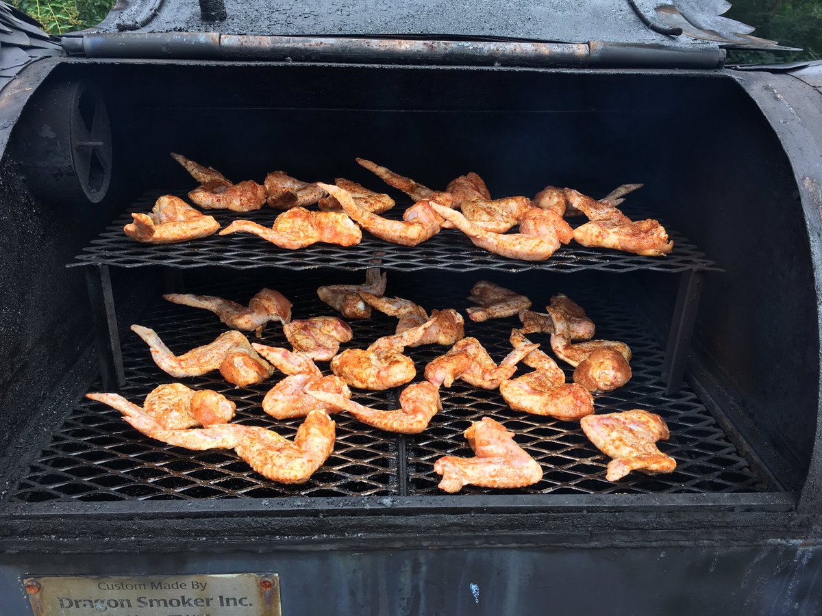 Wings rubbed with Dragon Dust and loaded into the dragon.  Using cherry wood and my honey bourbon glaze.