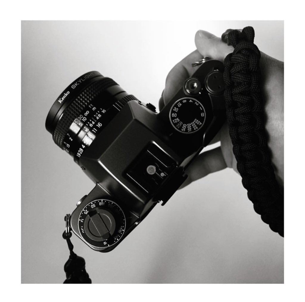 dsptch's tweet image. In our early days, people would tell us that there would be no more need for camera straps because of cell phones. #keepsnapping