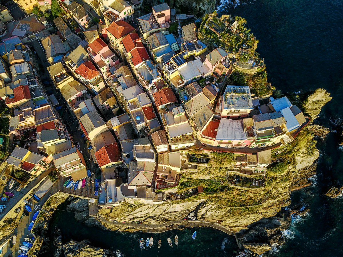A modest fishing village on the Italian Riviera, Manarola was established in the 14th century under the Republic of Genoa. #drone #Italy