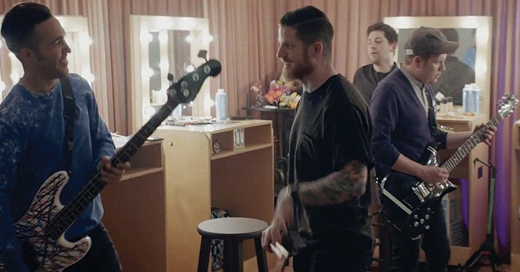 KerrangMagazine's tweet photo. Check out the new @falloutboy video for Champion! https://t.co/KHxHu2BaM7 https://t.co/FXx6H7gooe