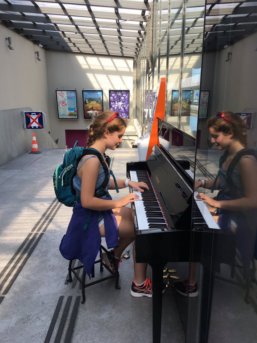 GeoffW57's tweet photo. @MusicDept_CCB Sophie en route to Chamonix finds a "spare" piano and decides to entertain travellers at the train station 😊 https://t.co/H3jAVHqIx3